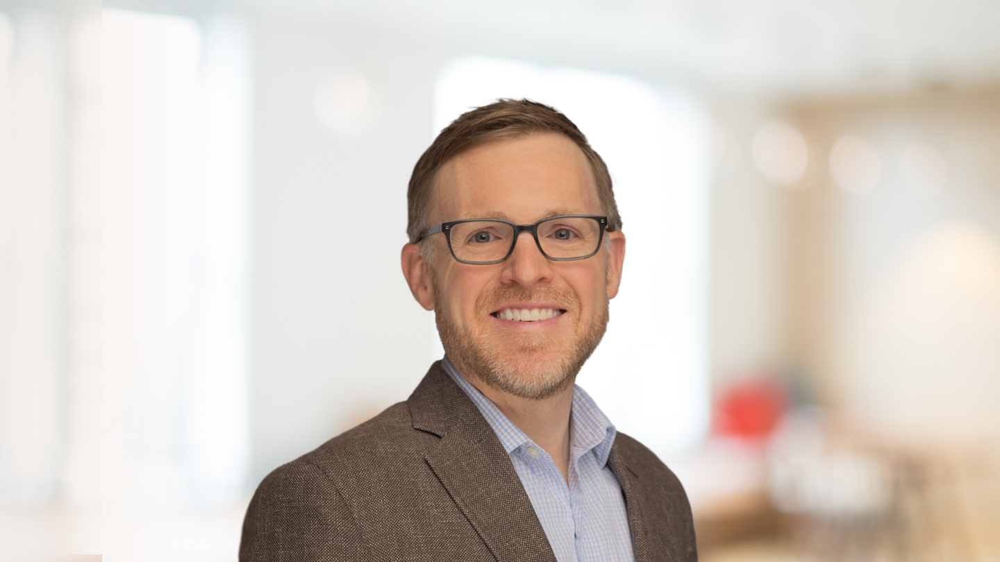 Headshot of Adam Cox